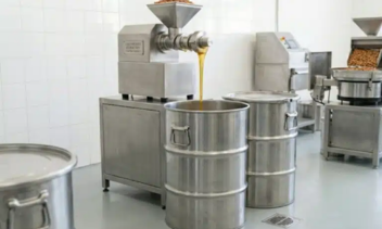 Mechanical cold pressing extraction of almond oil in a clean processing facility